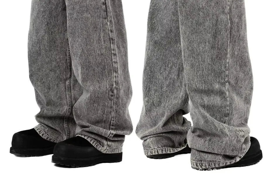 Grey loose fit straight-leg cotton denim trousers on a mid-rise waist mannequin