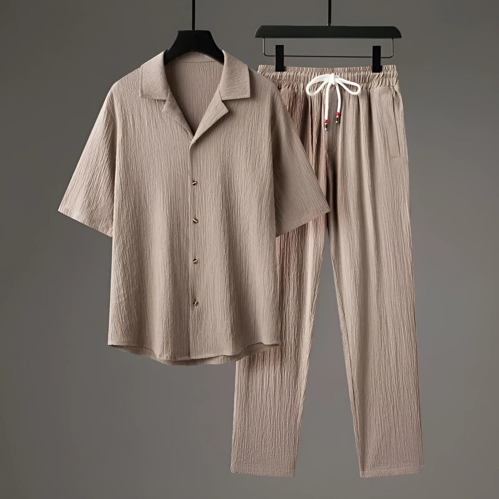 Men's national style two-piece sportswear set showing knitted half-sleeve top and full-length trousers