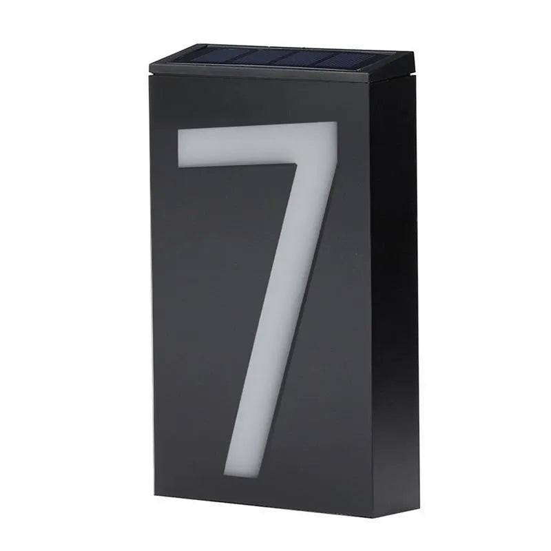 Solar powered outdoor house number light with LED illumination and concealed mounting design