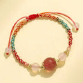 Hand-woven white agate and prehnite couple bracelet with 12mm diamond-shaped beads and electroplated finish on woman's wrist