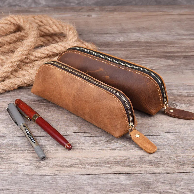 Square cowhide leather pencil case with zip closure measuring 18cm
