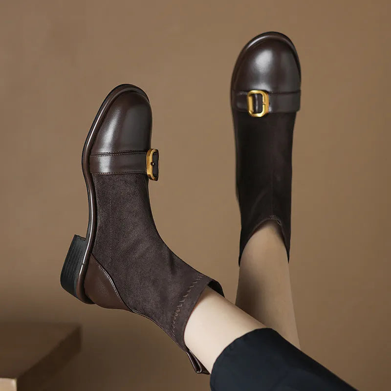 Women's black low heel Martin boots with belt buckle stitching and front lace-up design