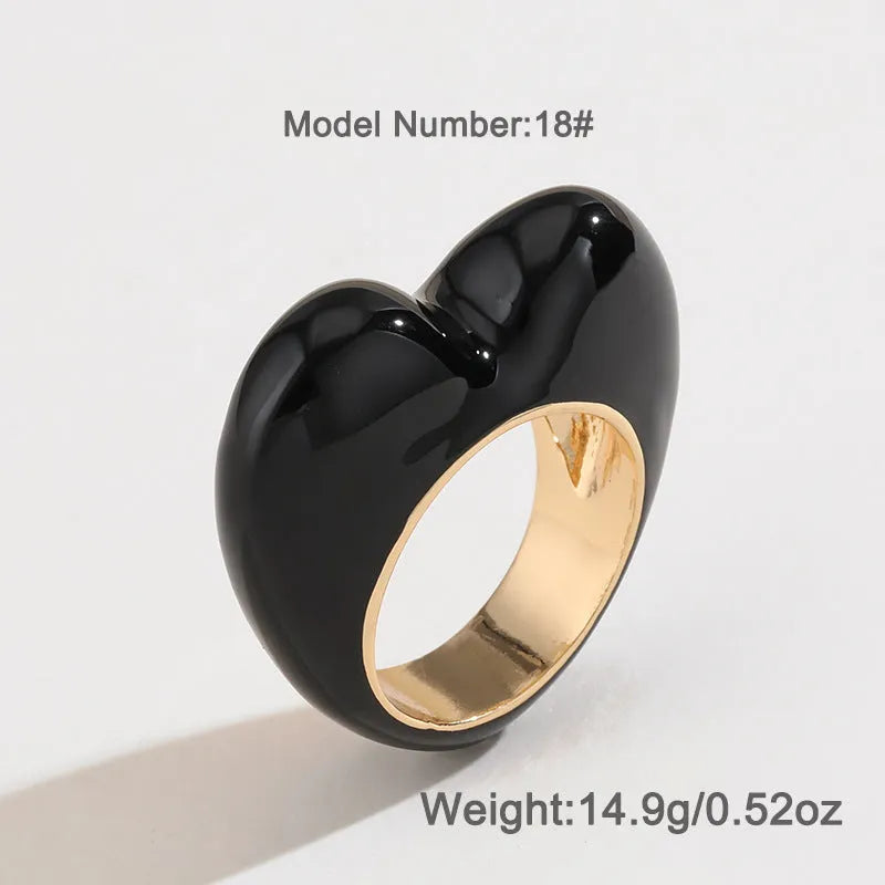 Heart-shaped three-dimensional enamel ring in zinc alloy showing raised colourful design