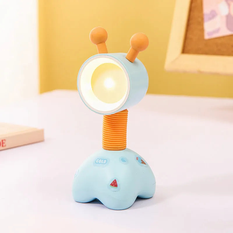 Cartoon animal magnetic night lamp with adjustable head on metallic surface