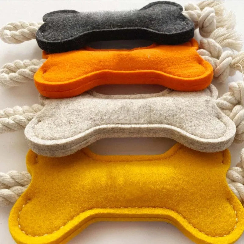 Bone shaped dog toy with rope knot design in choice of four colours for bite resistant training