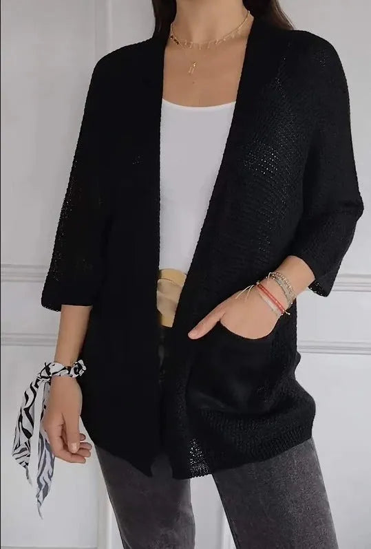 Women's army green waffle weave cardigan coat with nine-quarter length sleeves and pockets.