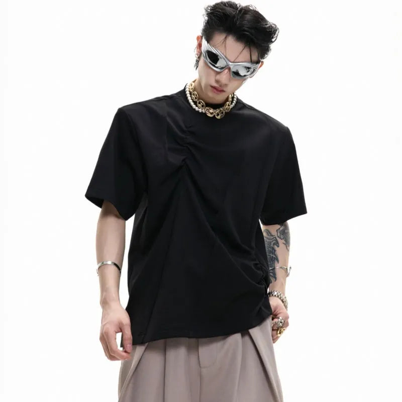Men's grey cotton T-shirt with pleated detail and a round neck on a hanger.