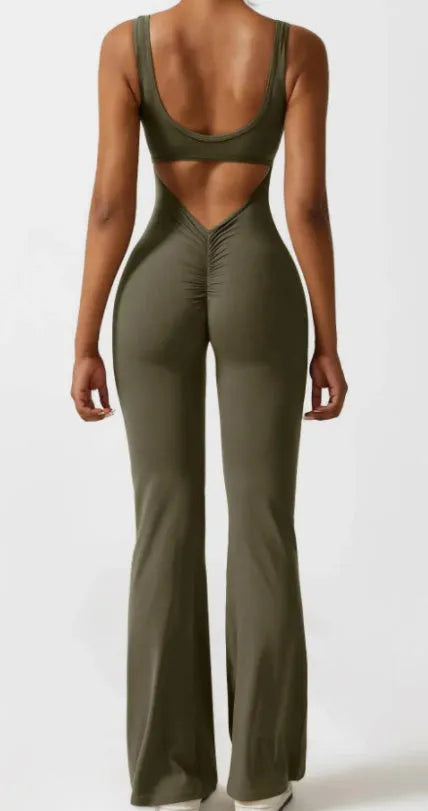 Black women's tight seamless yoga bodysuit with a mid waist and trousers length.