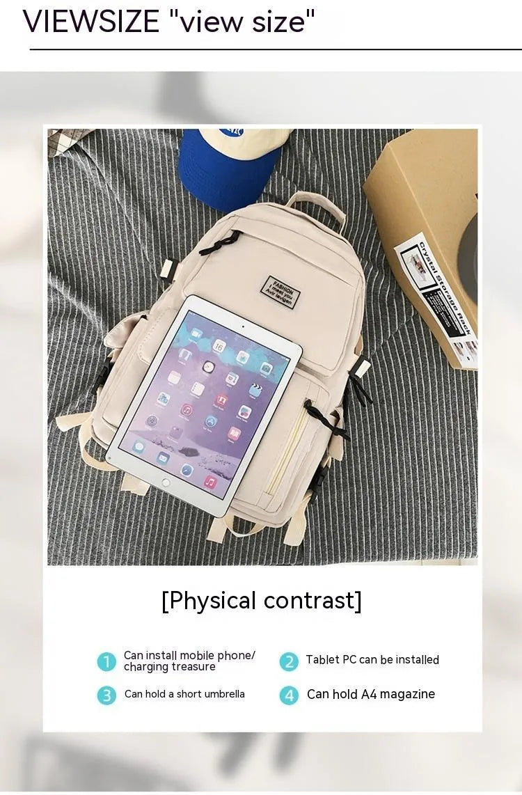 Black nylon student backpack showing laptop compartment and three-dimensional pockets
