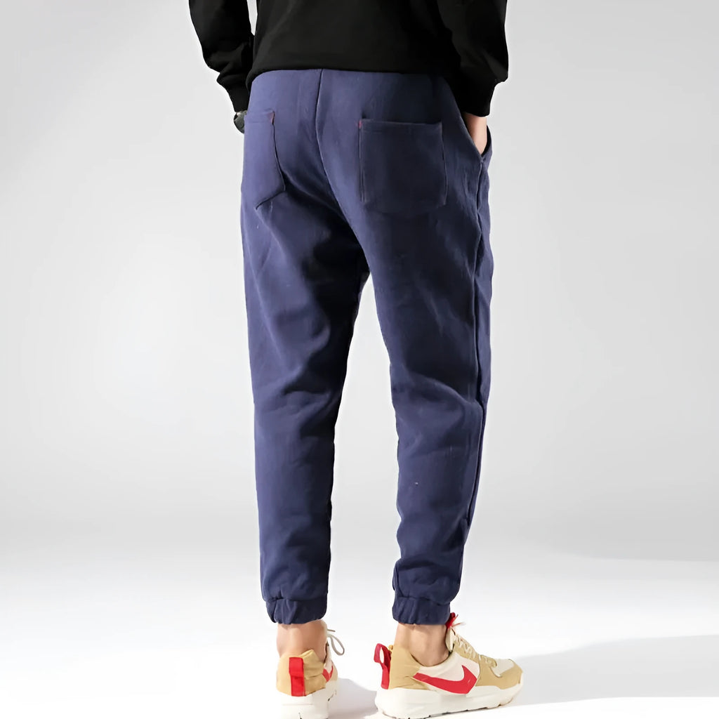 Irukite men's high waist loose winter trousers in black with belt and zip fly, plus velvet lined