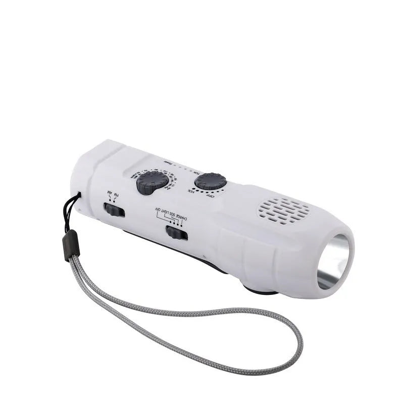 Hand-cranked emergency radio flashlight with USB charging port built-in speaker and manual tuning dial in black
