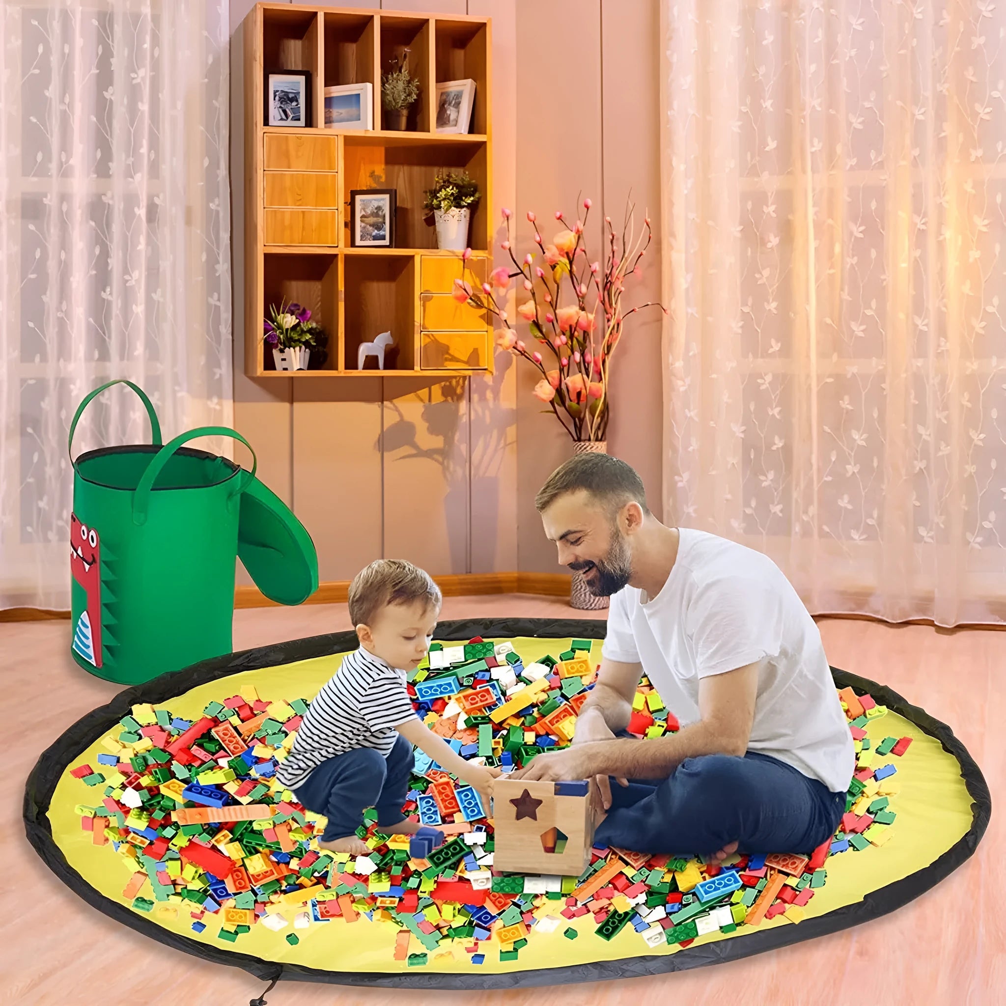 Green felt storage bag cinched closed with pull rope, shown next to it laid flat as a play mat