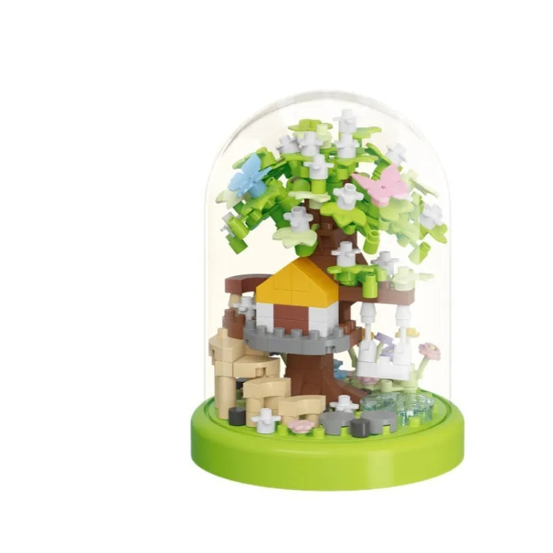 Micro particle building block set showing Cherry Blossom Tree House model in colour box
