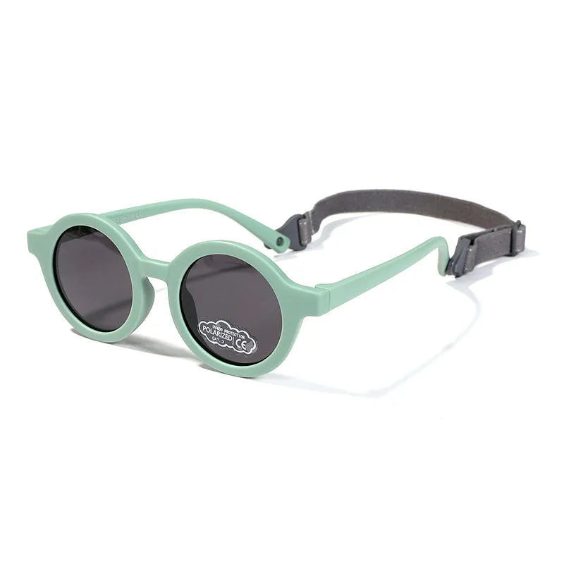 Children's round sunglasses for 0-3 year olds with UV400 protection, shown in a selection of colours.