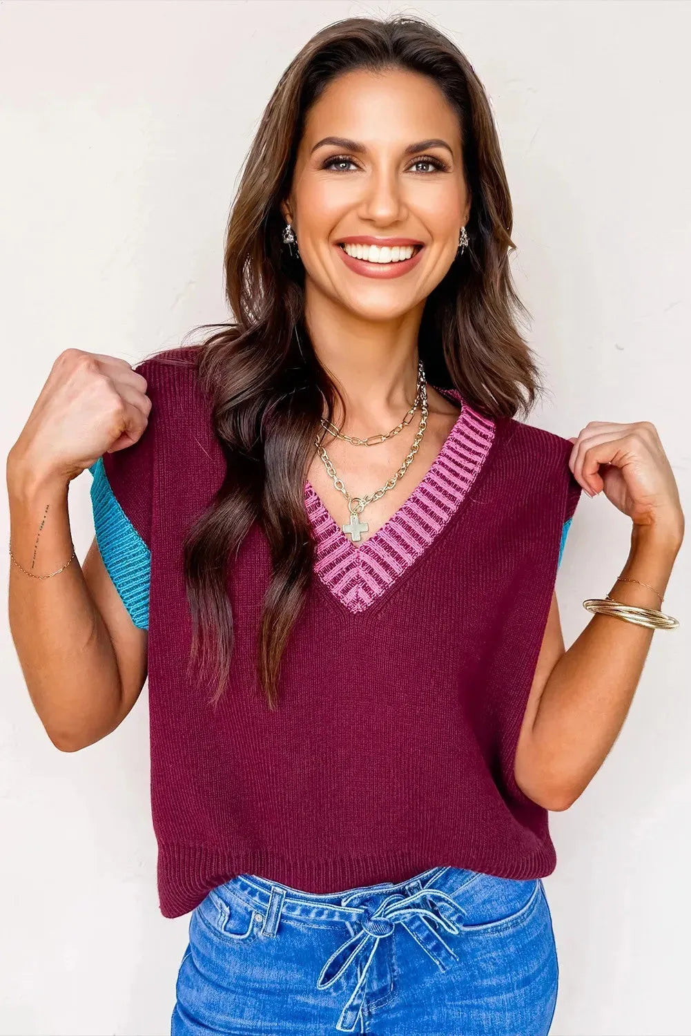 Burgundy women's V-neck loose sweater with contrast trim and short cuffed sleeves