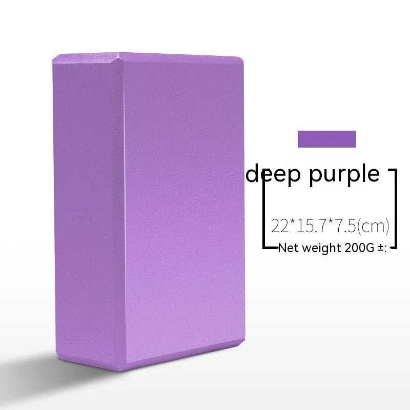 High-density EVA foam yoga block in various colours and prints on a workout mat.