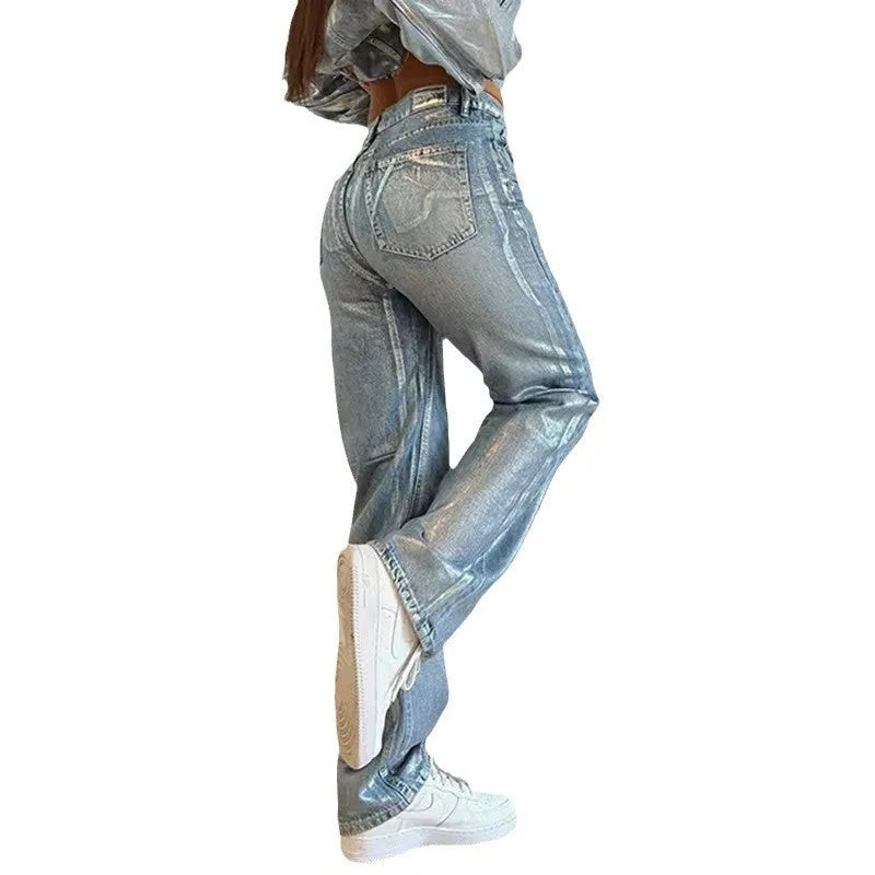 Washed blue high-waist straight-leg jeans on a hanger, showing the front view.