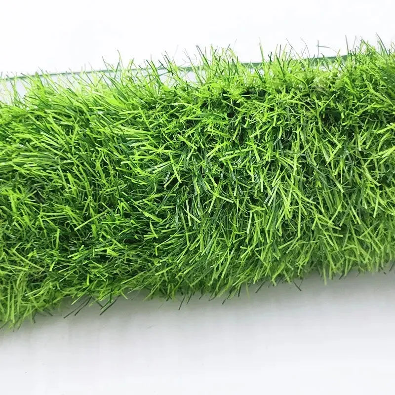 Artificial grass dog toilet training mat with non-slip backing, shown in three available sizes.