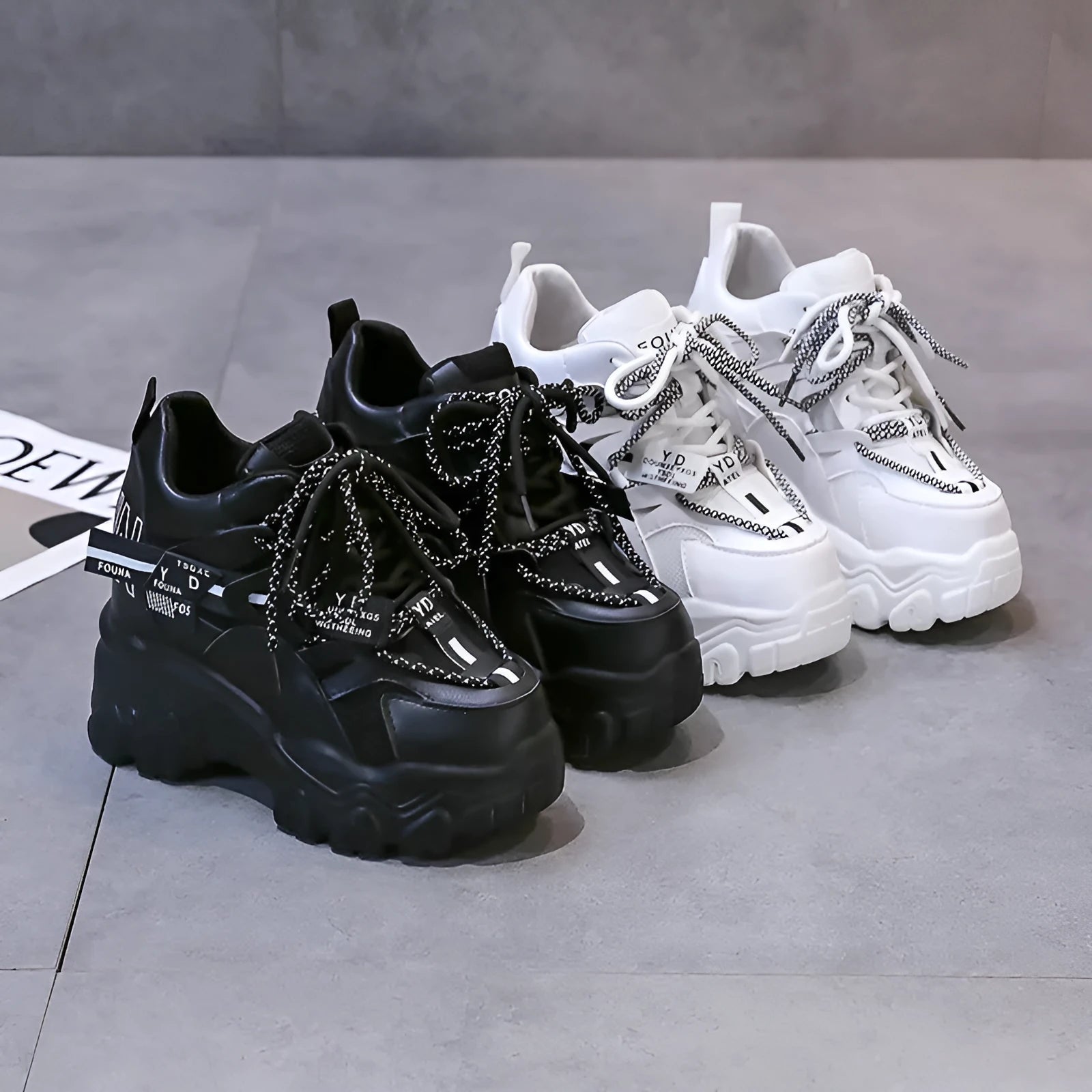 Women's white breathable mesh platform sports shoes with cross strap and rubber sole.