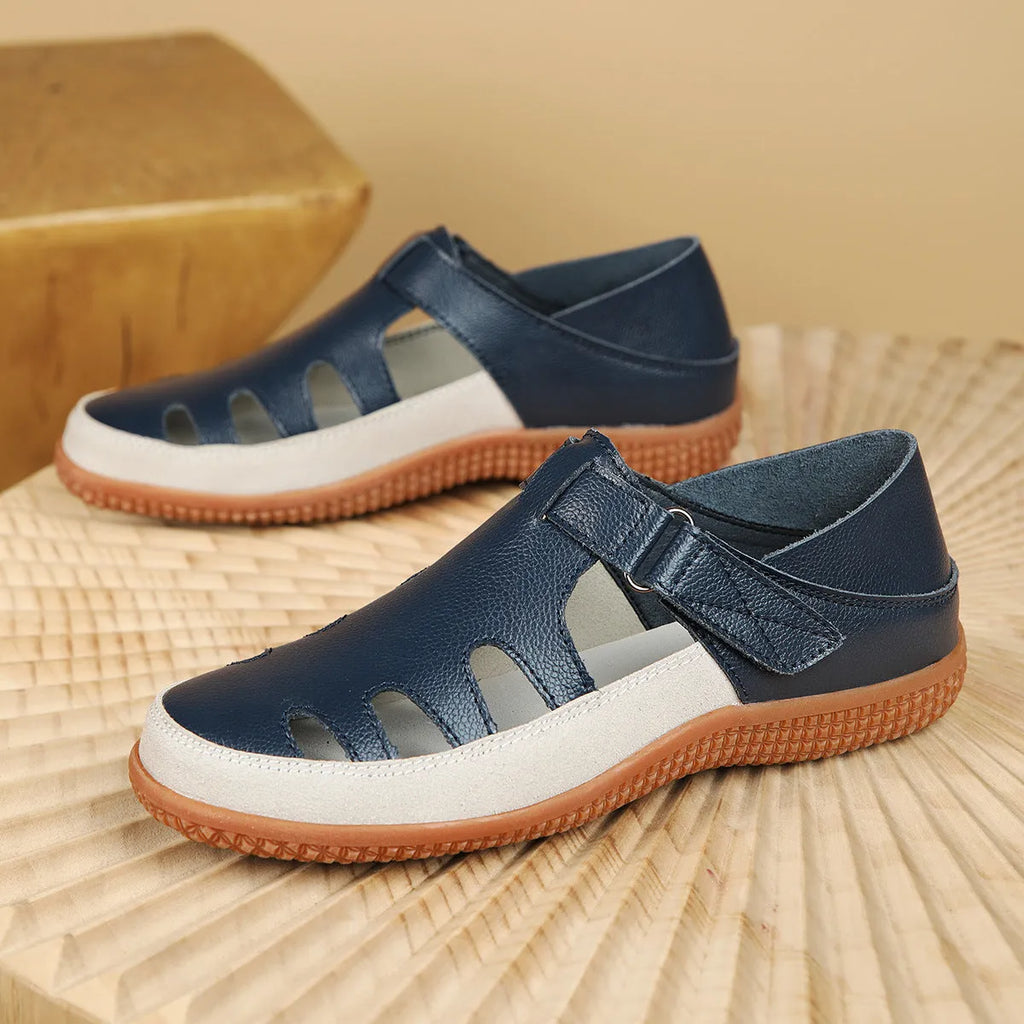 Plus size women's flat sandals with hollow-out design and toe cap in blue, red, or white.