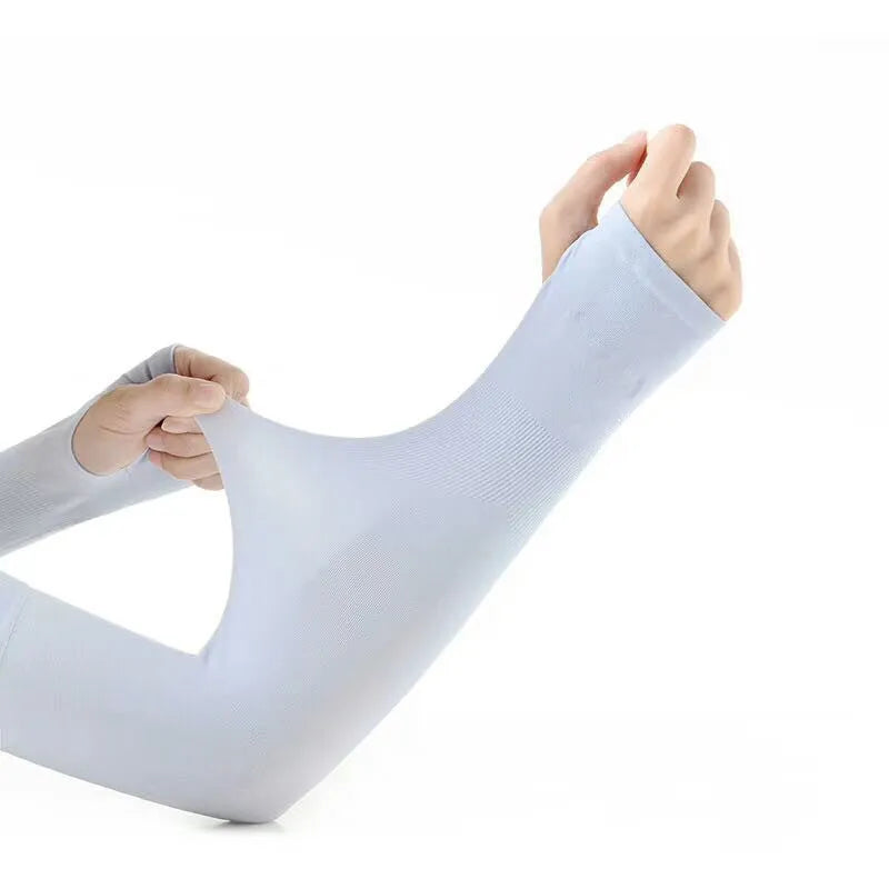Unisex black sun protection driving sleeve with open finger design on an arm.