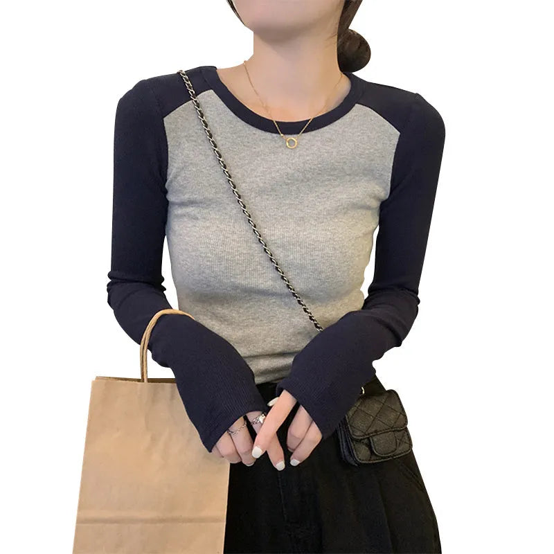Women's oversized long sleeve top in dark blue black or green with princess sleeves and embroidery details