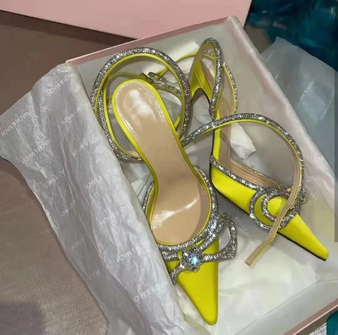Women's black stiletto heel sandals with silk bandage detail on back and buckle fastening.