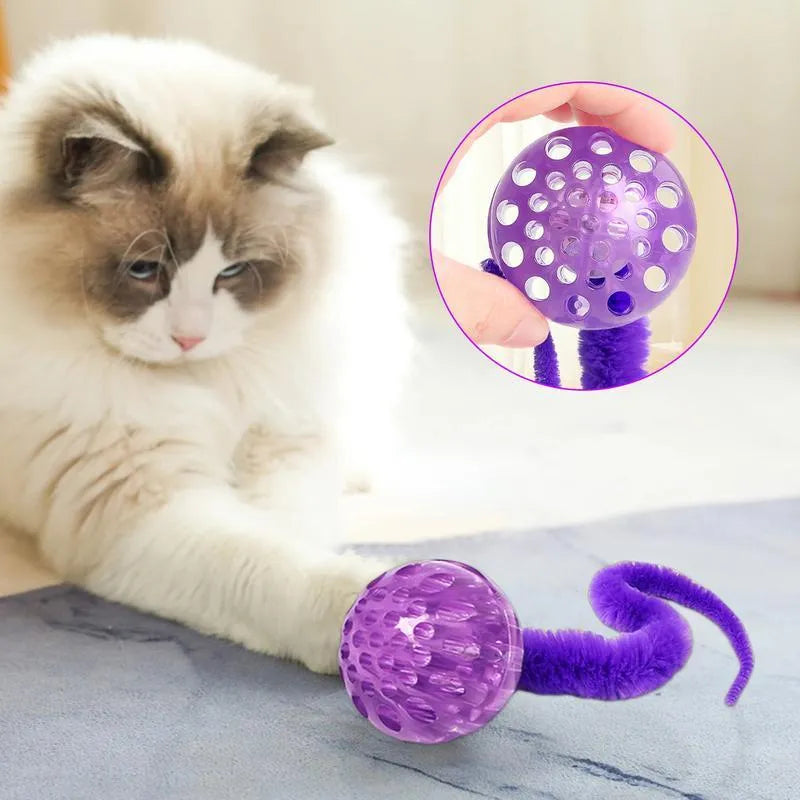 Interactive cat toy with three bouncy TPR balls connected to long plush tail in green colour
