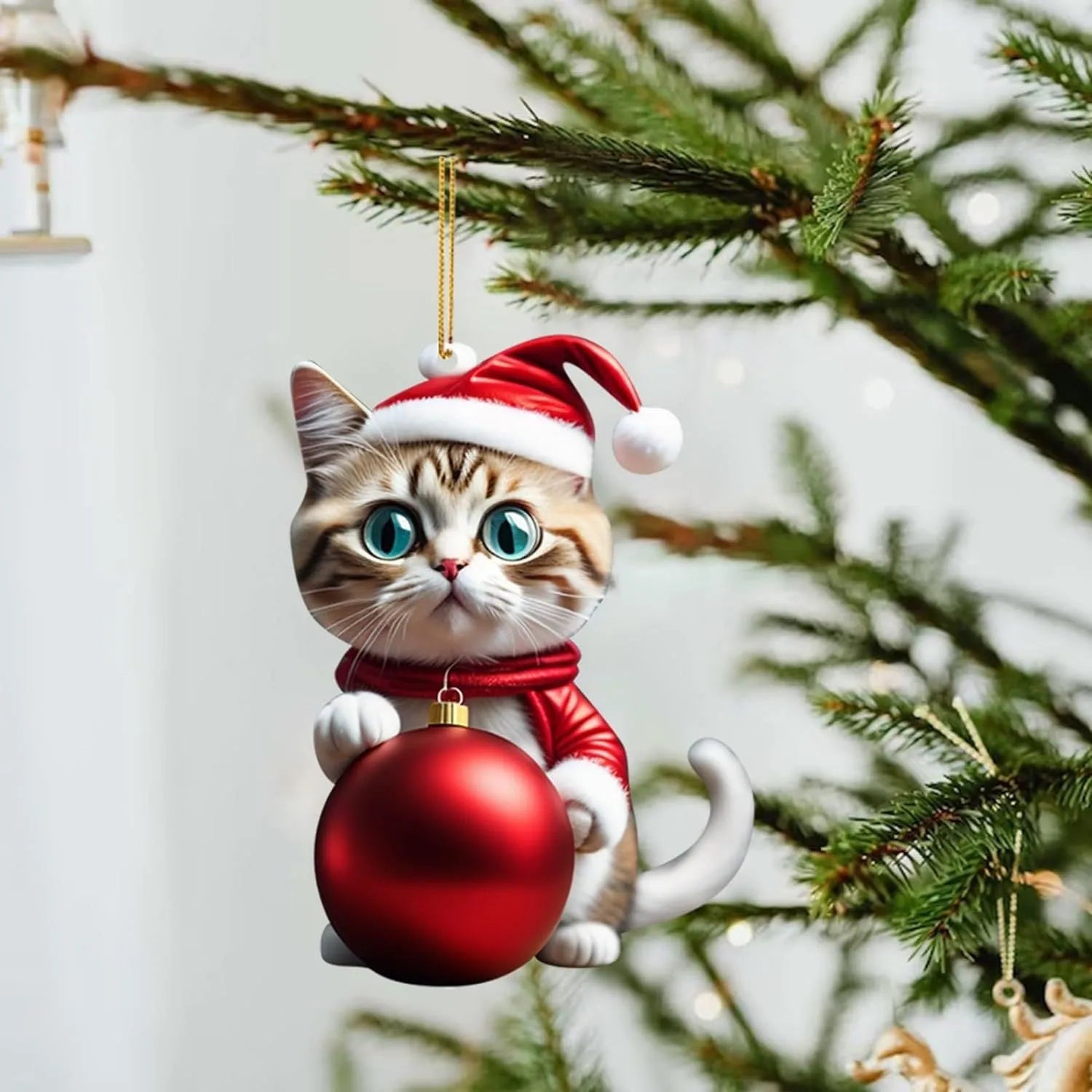 Colourful cartoon-style kitty cat Christmas ornament hanging, made from clear acrylic for car interiors.