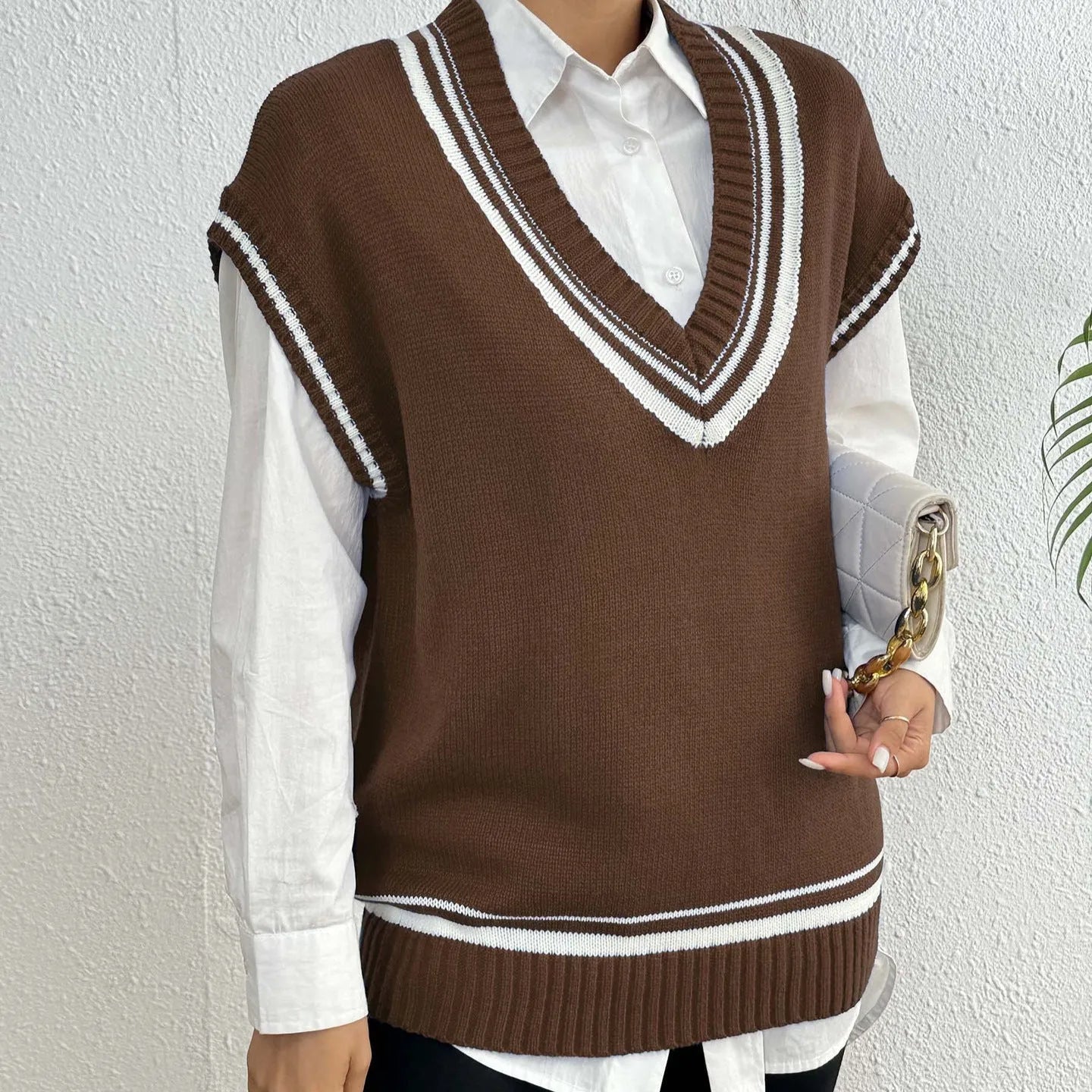 Women's college style vest sweater in acrylic polyester blend fabric, loose fit, available in black blue coffee colours