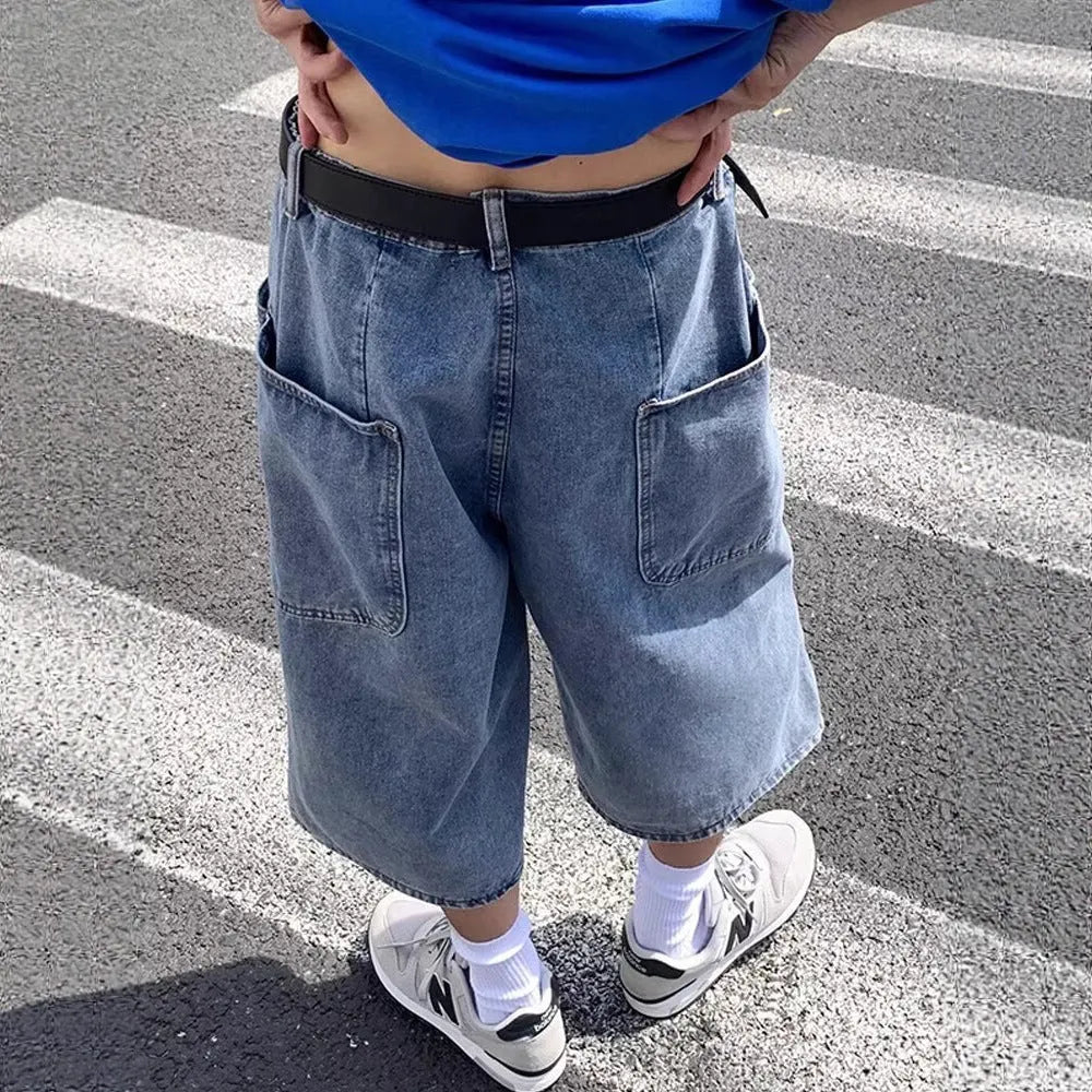 Blue men's washed denim pirate shorts with high waist and zipper fly.