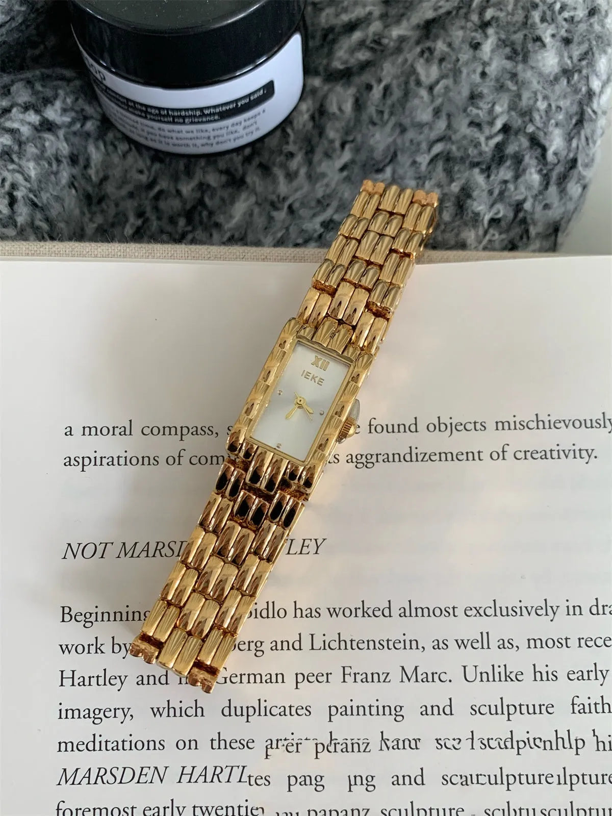 Women's antique-style bracelet watch with butterfly clasp in silver or gold with white or grey dial faces