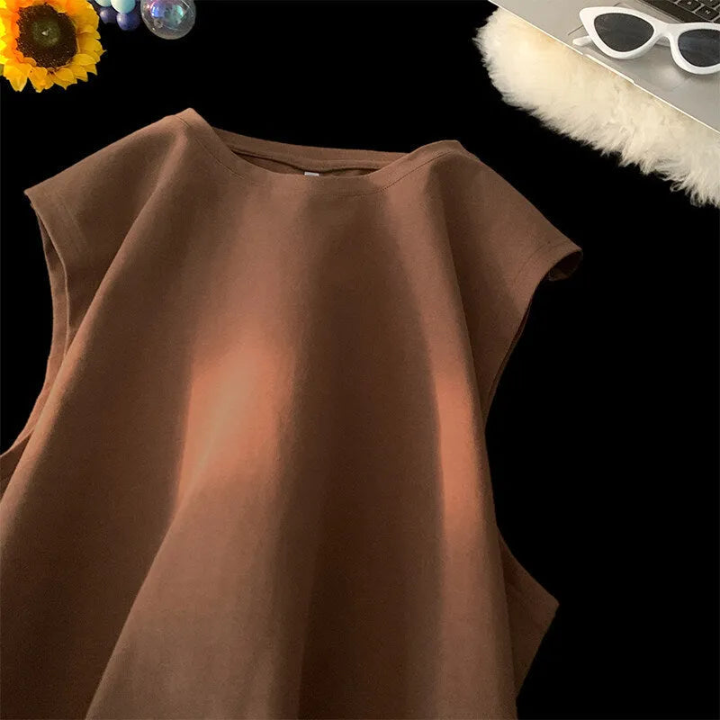 Men's loose fit sleeveless cotton tank top in solid colour on a hanger