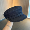 Dark blue denim octagonal newsboy hat with adjustable 54-58cm sizing and colour accent brim options