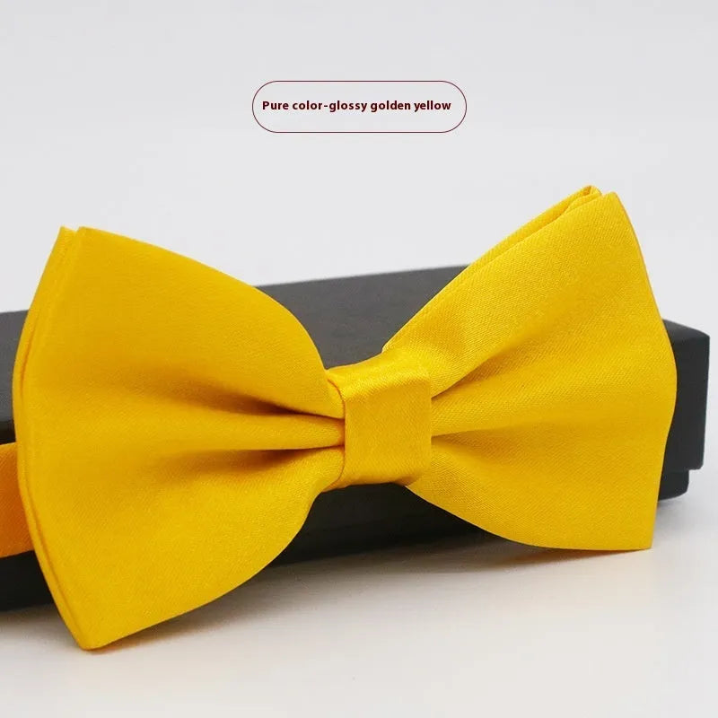 Solid colour polyester bow tie with flat head design measuring 12cm by 6cm