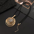 Gold tone geometric plaid pendant on a textured snakeskin wax rope chain necklace, adjustable from 51cm to 80cm.