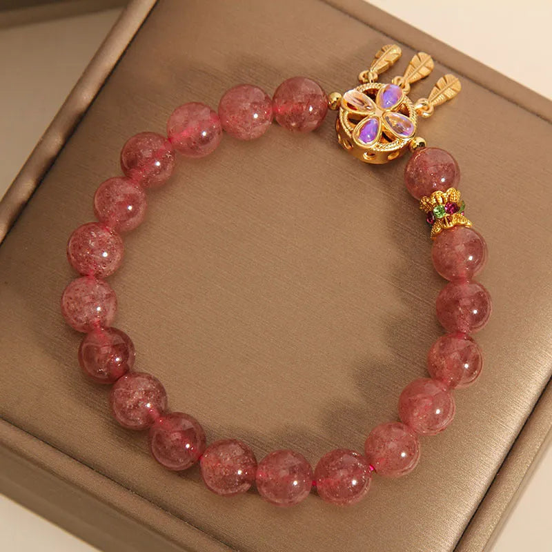 Women's strawberry quartz bracelet with four-leaf clover dream catcher pendant