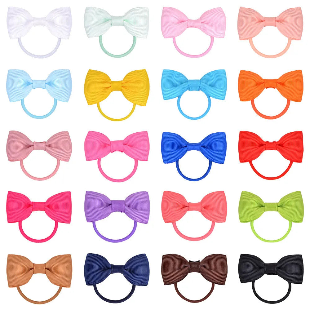 80 multi-coloured baby hair ties with small grosgrain ribbon bows for infants and toddlers.
