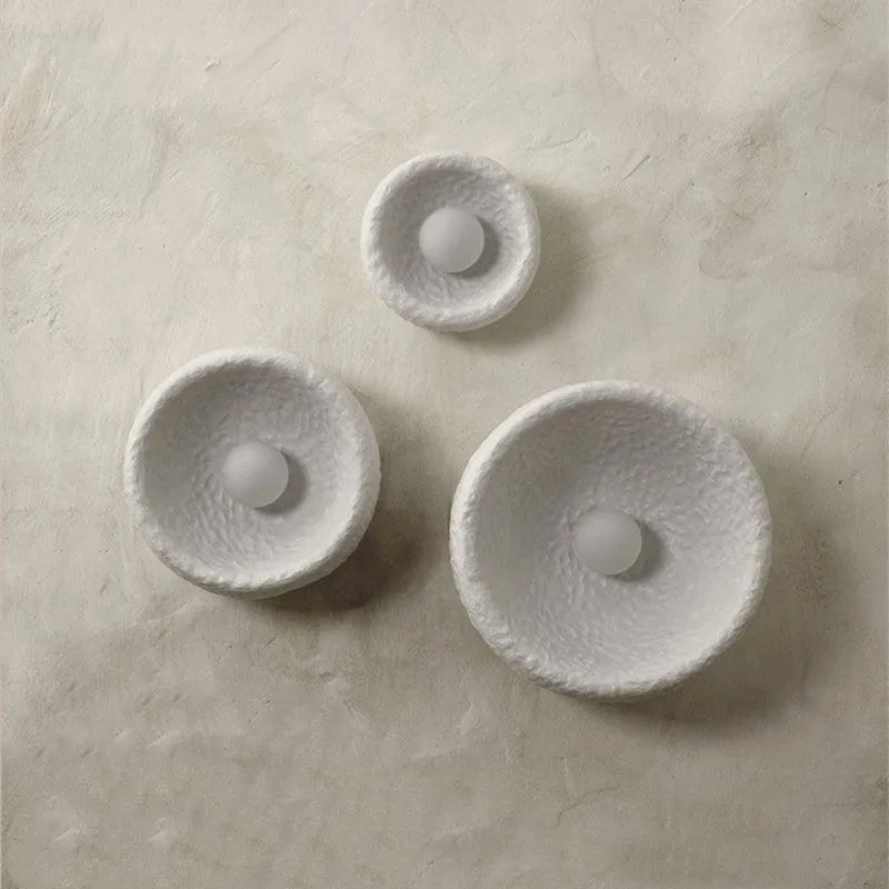Japanese-style minimalist resin wall lamp in warm light, showing size options.