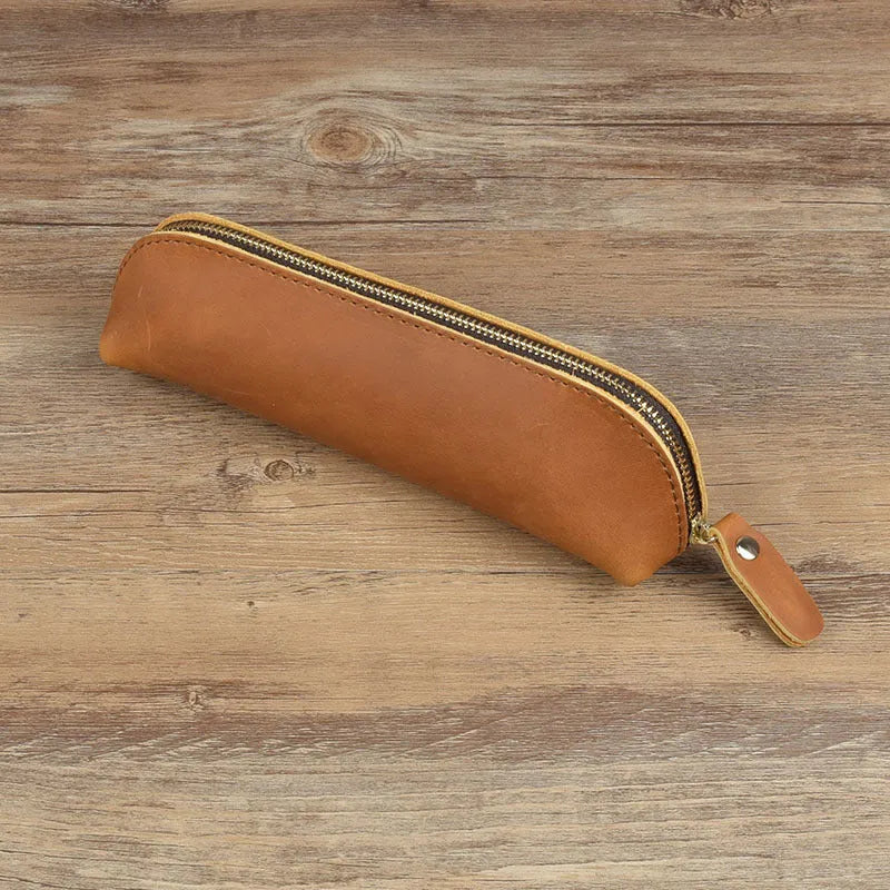 Square cowhide leather pencil case with zip closure measuring 18cm