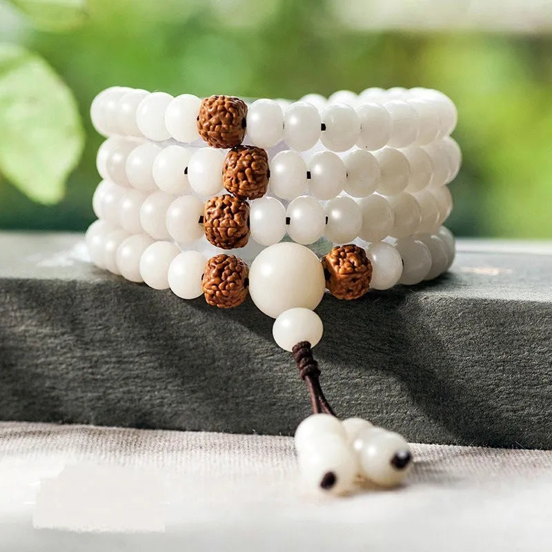 White jade Bodhi beads long bracelet with 6x8mm beads, showing various style options.