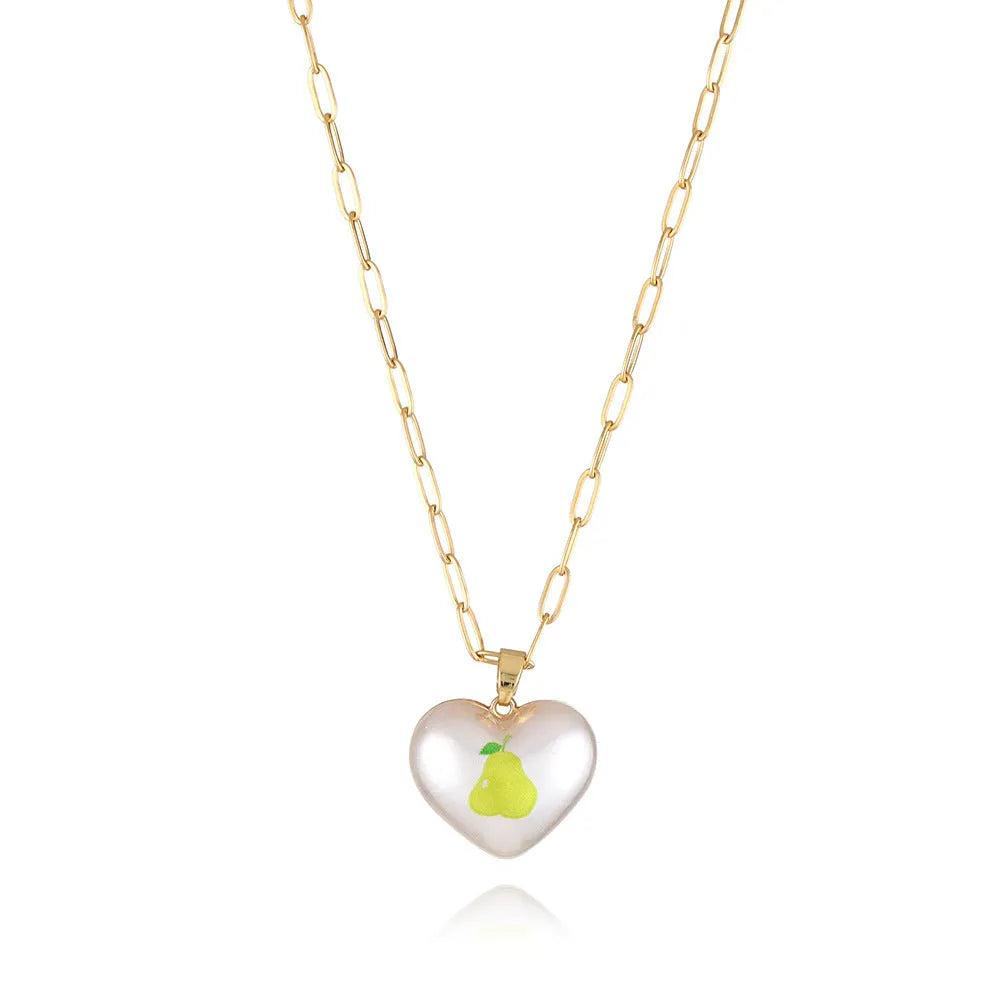 Geometric fruit charm necklace with an adjustable chain, shown in strawberry, pineapple, apple, pear, and cherry colour variants.