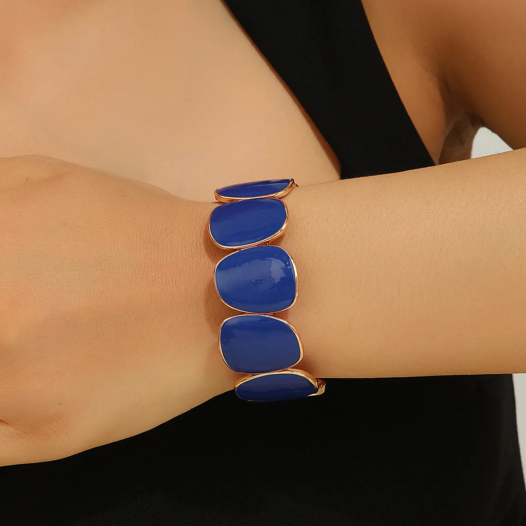 Adjustable coloured bracelet with metal toggle clasp, available in five colours