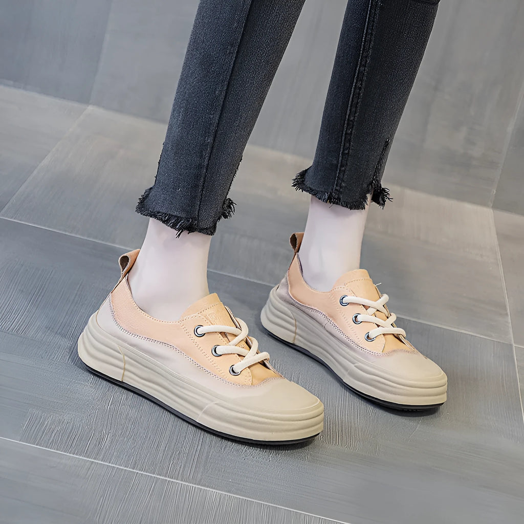 Women's leather platform sneakers in matcha green, side view showing round toe and lace-up design.