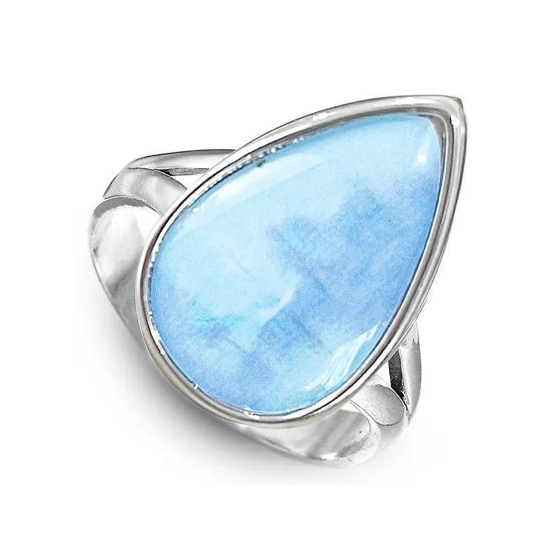 Women's copper water drop ring with white gold finish on white background