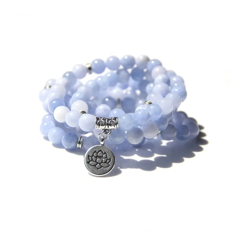 Women's bracelet with natural stone lotus pendant in geometric design showing eight colour variations