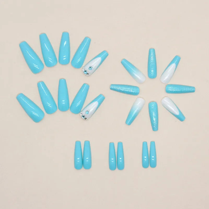 Blue false nails with diamond glitter accents in ballet shape, includes patches and glue