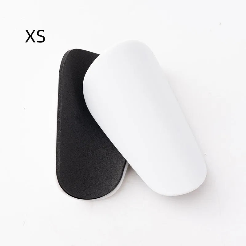 PU mini shin guards in black, white, red, and dream blue colours with S and XS sizing codes