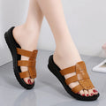 Women's large size soft sole slippers in beige, black and brown colours with flat bottom design