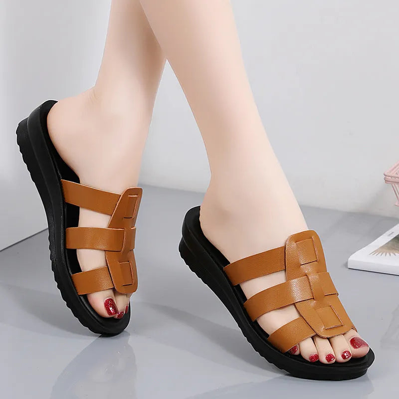 Women's large size soft sole slippers in beige, black and brown colours with flat bottom design
